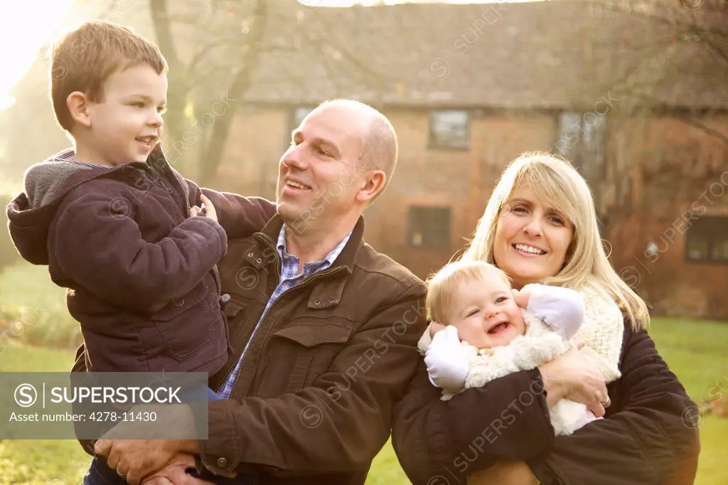 Portrait of Family of Four Outdoors