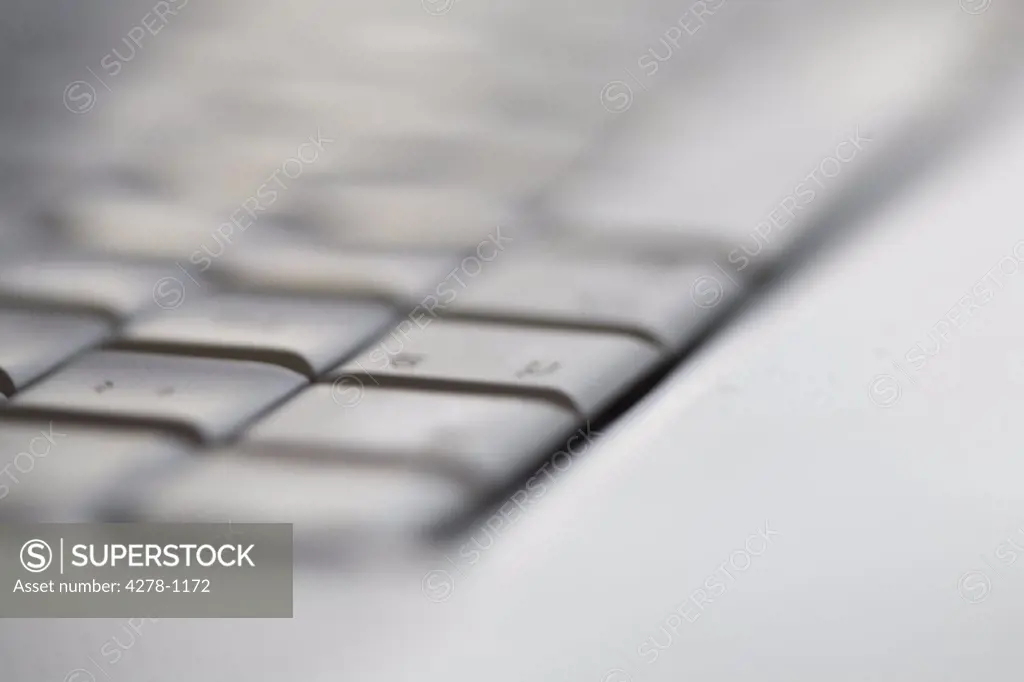 Extreme close up of a laptop computer keyboard
