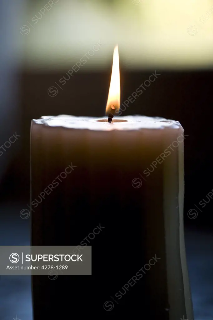 Close up of burning scented candle