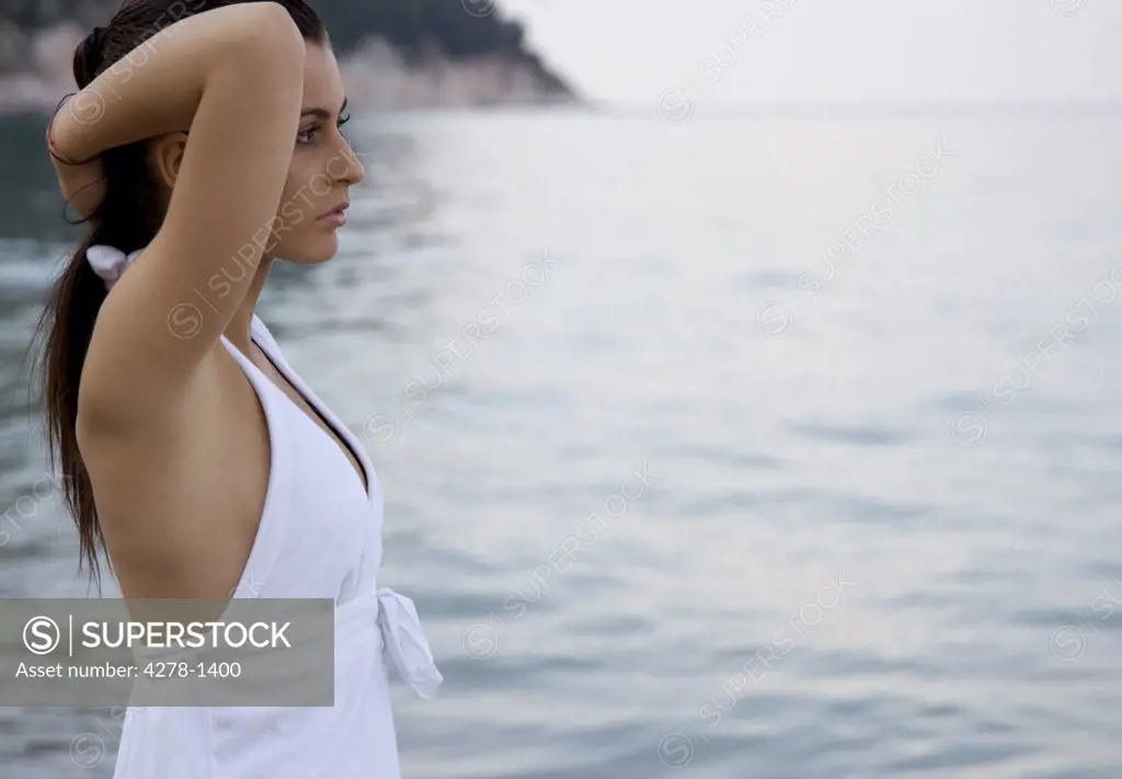 Portrait of a woman standing on beach