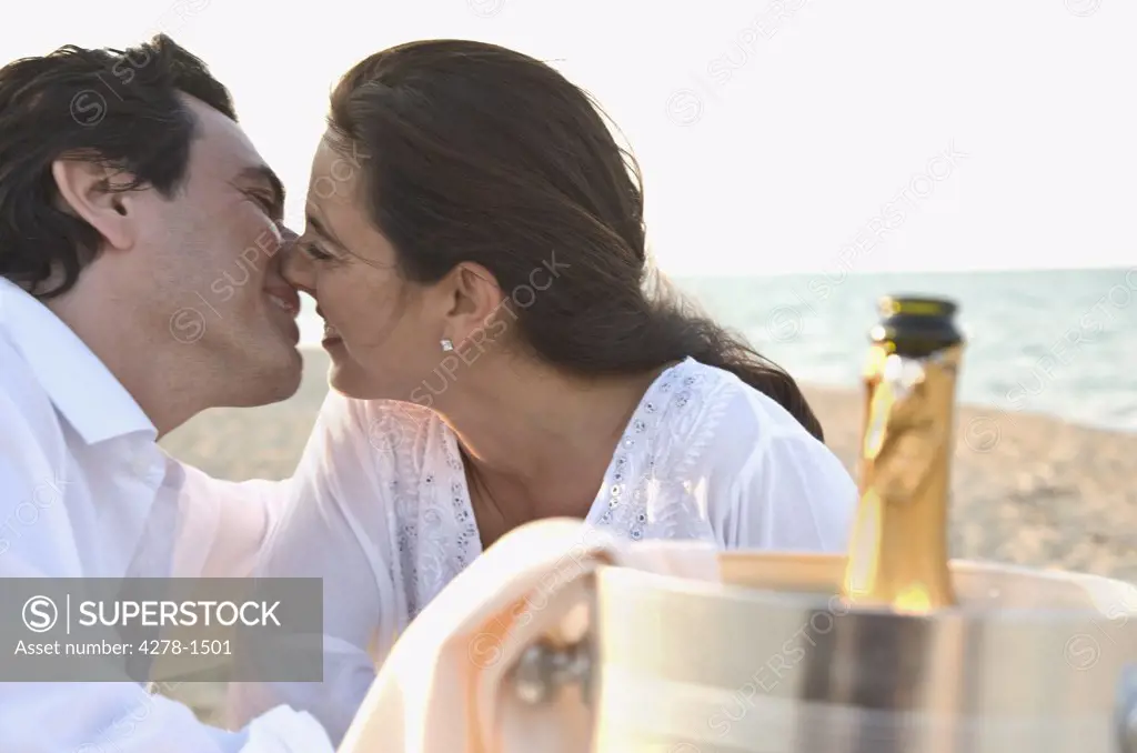 Couple on Beach Kissing