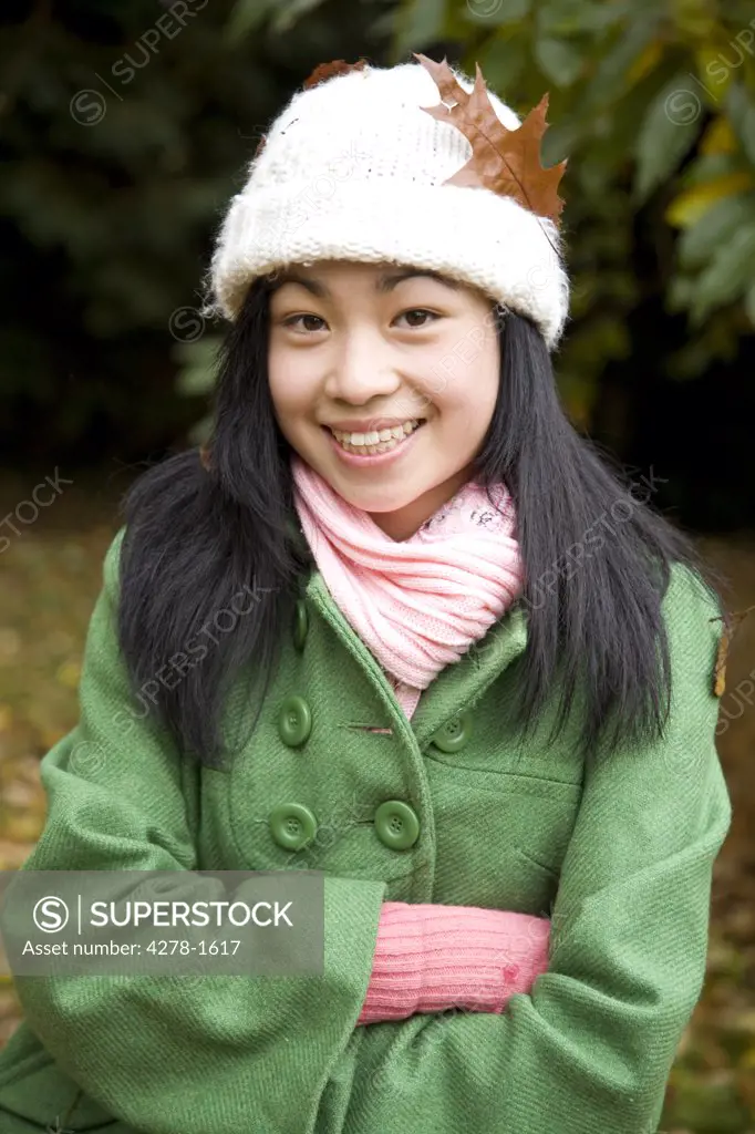 Portrait of young teen with woolly hat