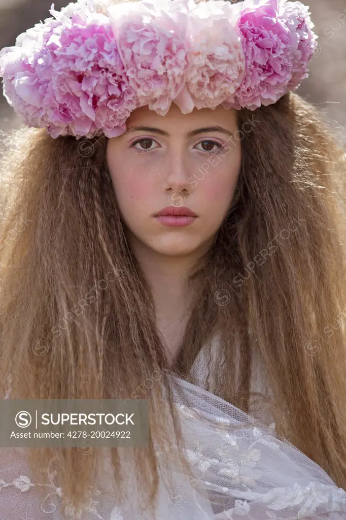 Young Girl Wearing Flower Garland on Head