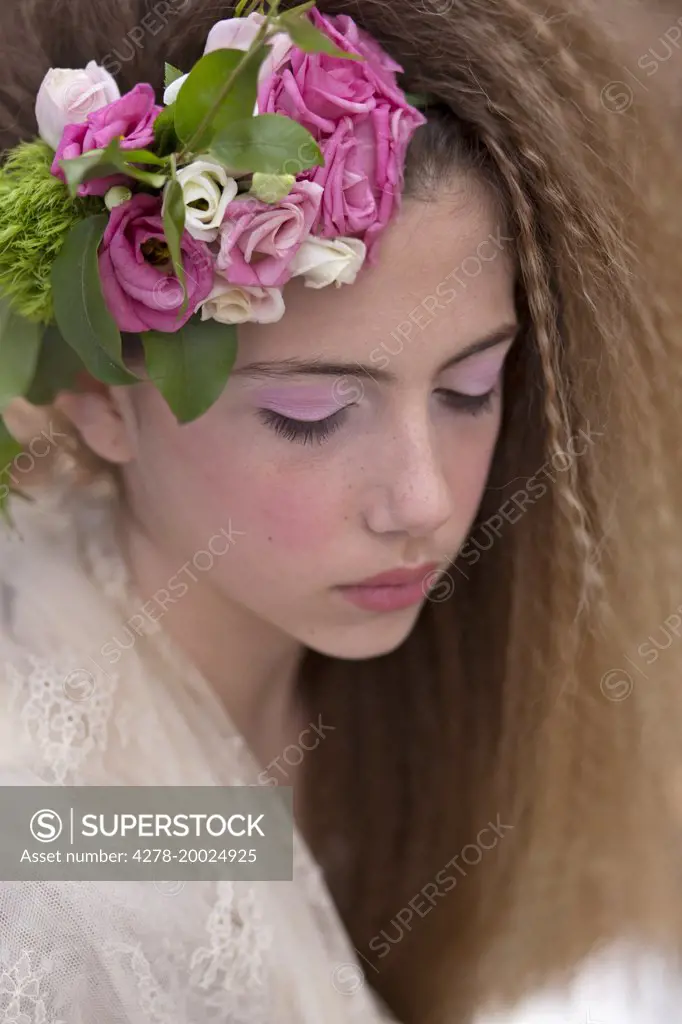 Young Girl Wearing Roses Headpiece