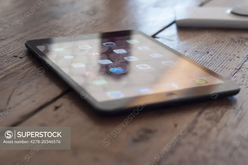 Tablet PC on Wooden Table