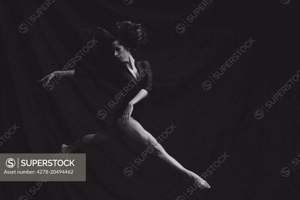 Female Dancer Leaping Mid air