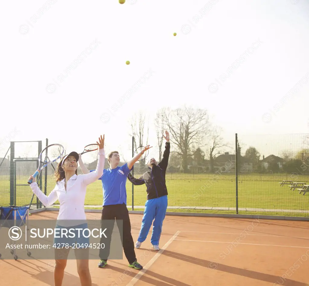 People Practicing Tennis