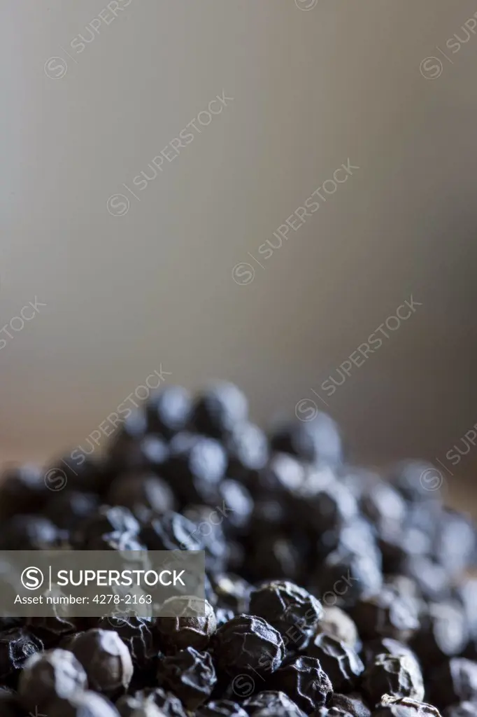 Close up of pile of black peppercorn