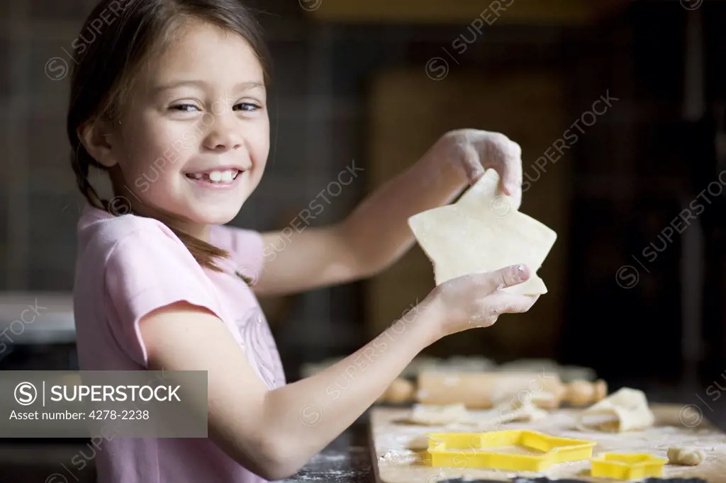 Young girl baking