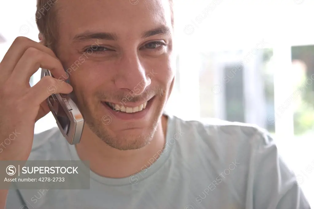 Close up of young man on cell phone