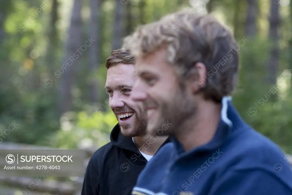 Young men laughing and smiling