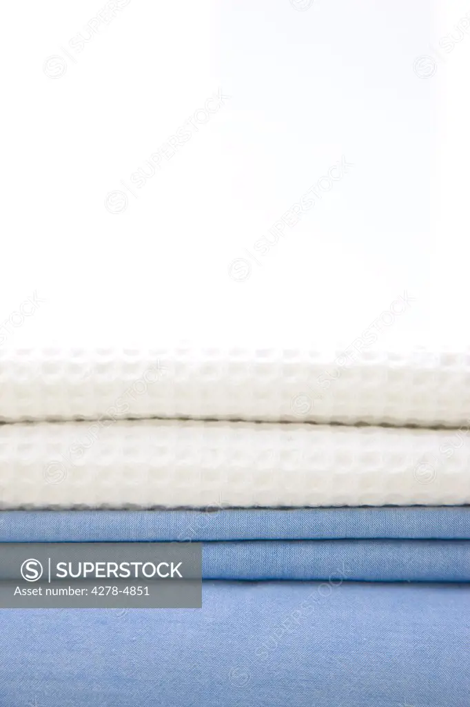 Close up of a stack of bed linen