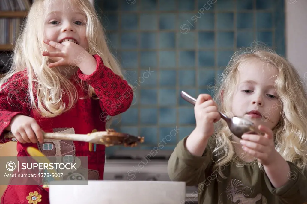 Two girls eating