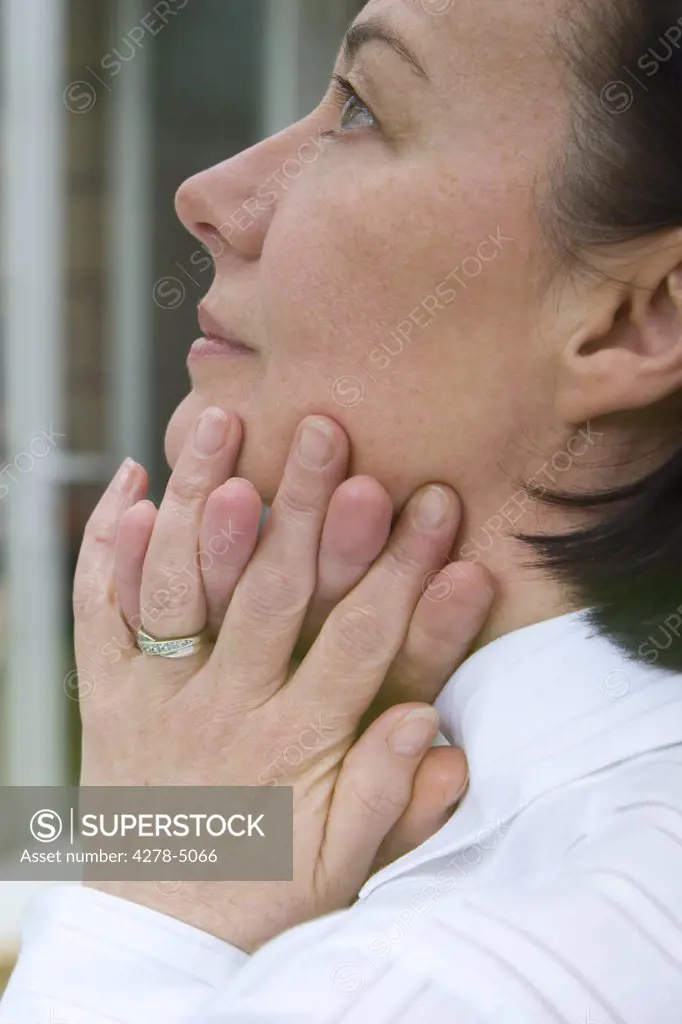 Woman with clasped hands