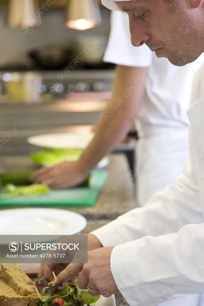 Chef preparing a salad