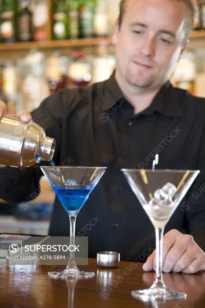 Barman preparing a cocktail