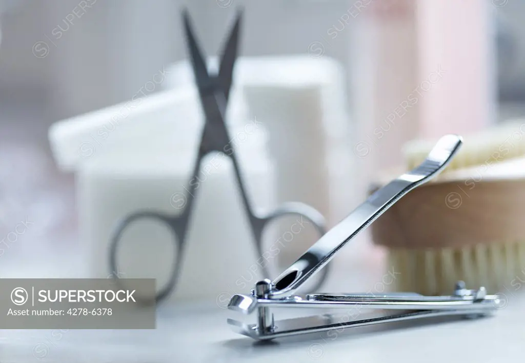 Close up of nail clippers and scissors