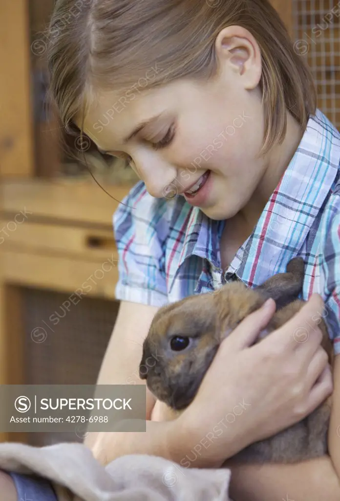 Girl Holding Rabbit