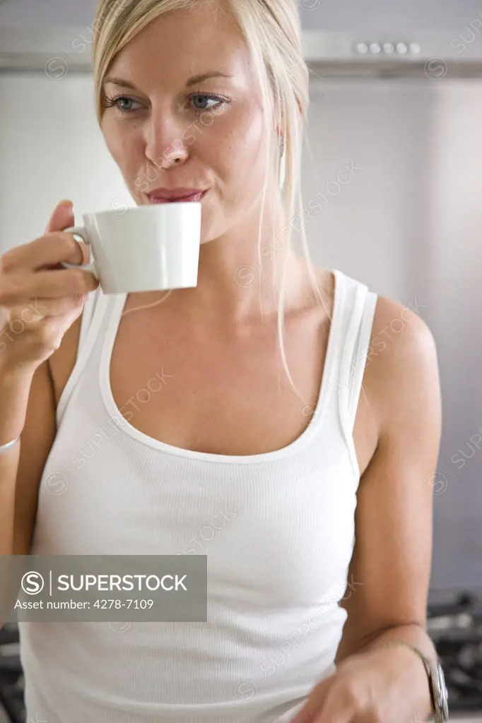 Woman Holding Cup