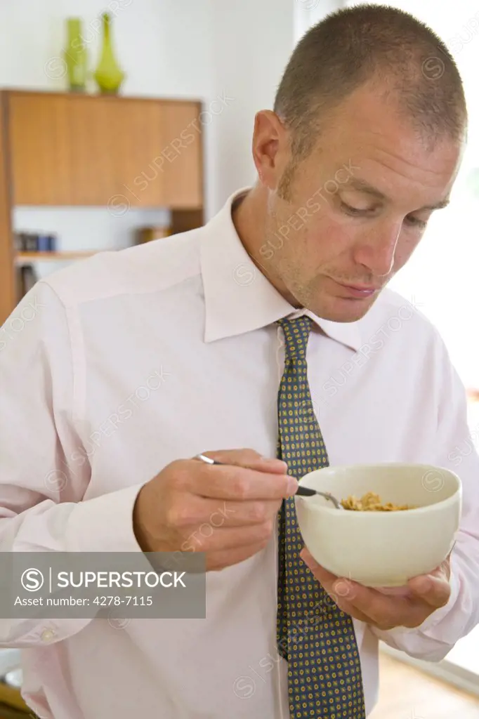Businessman Eating Cereal