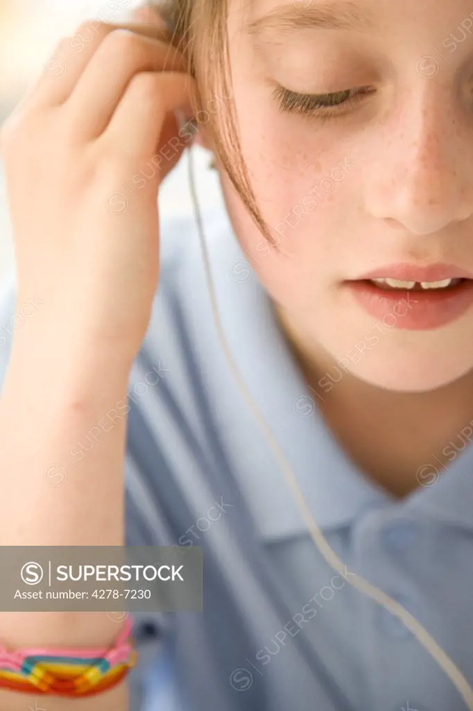 Girl Wearing Earphones