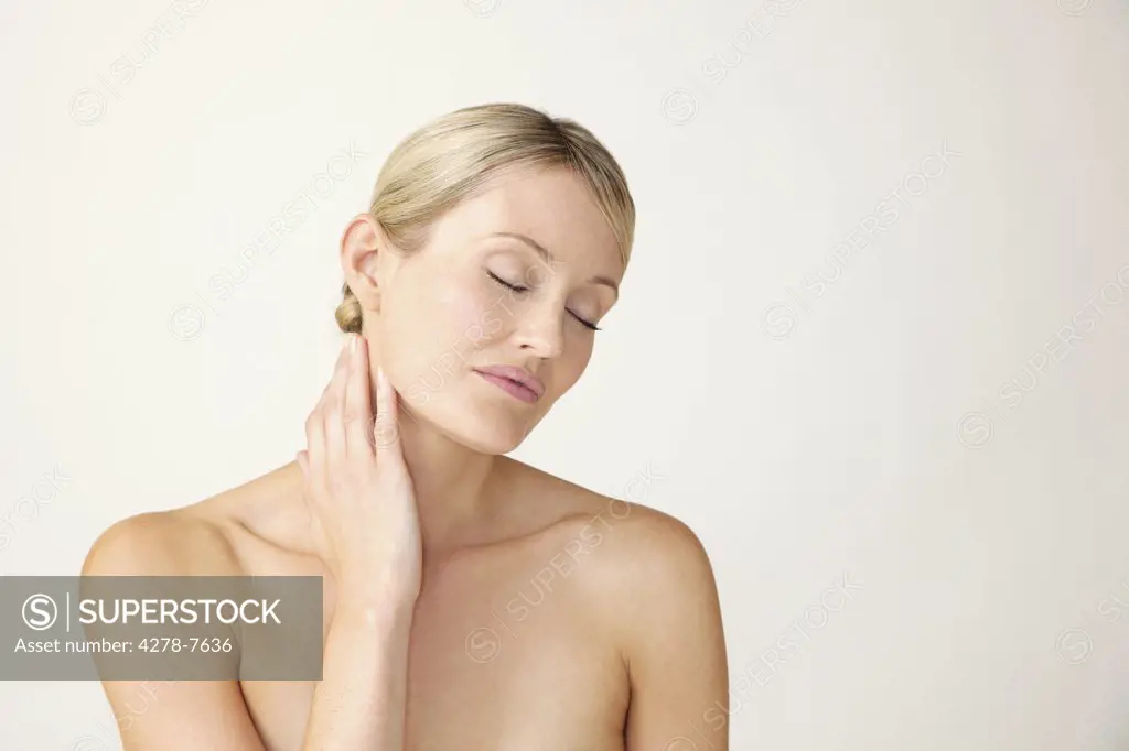 Woman with Hands on Neck