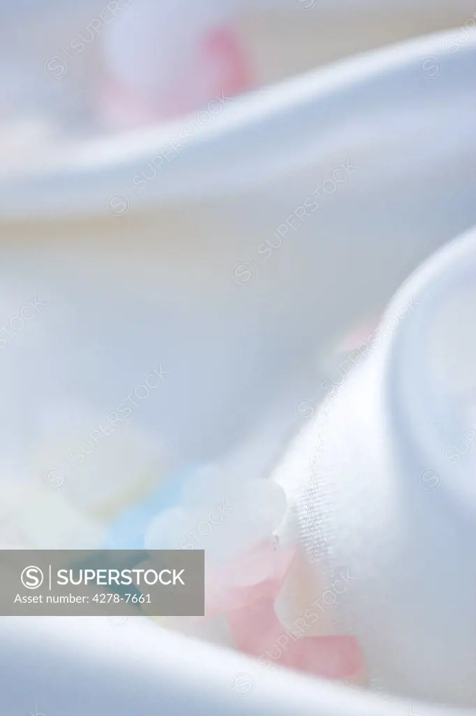 Pastel Colored Confetti on White Silk