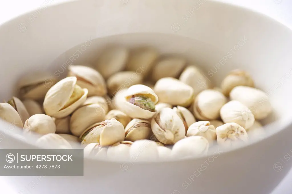 White Bowl Filled with Pistachios