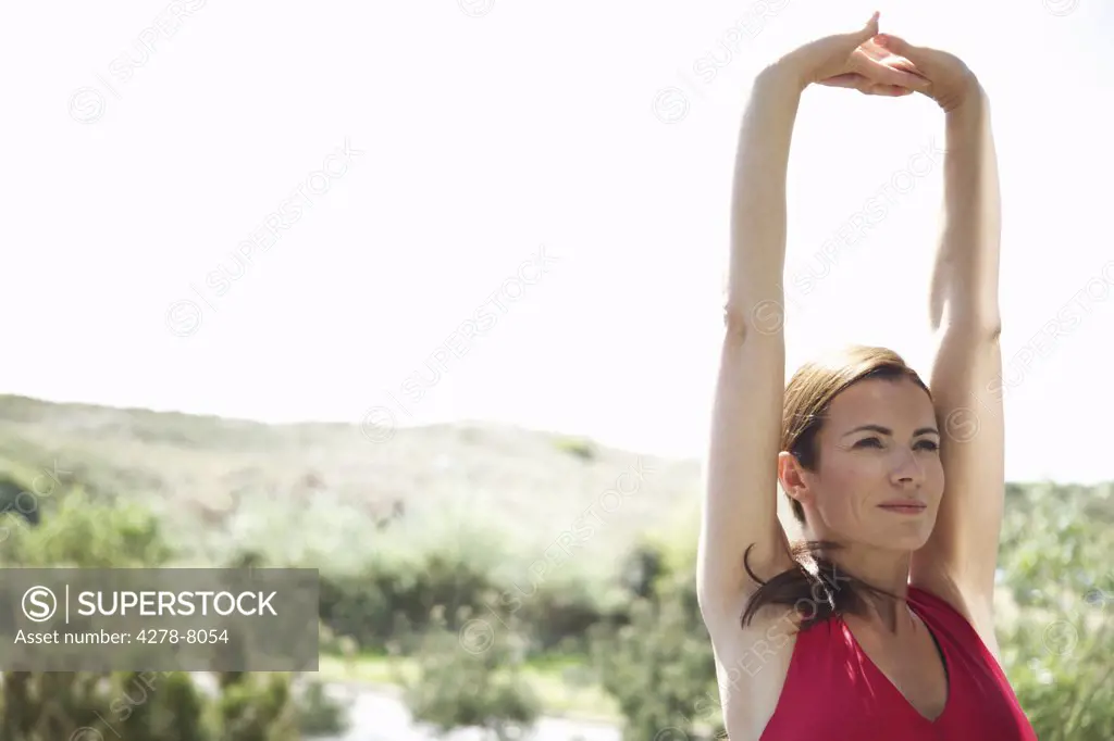Woman Stretching Outdoors