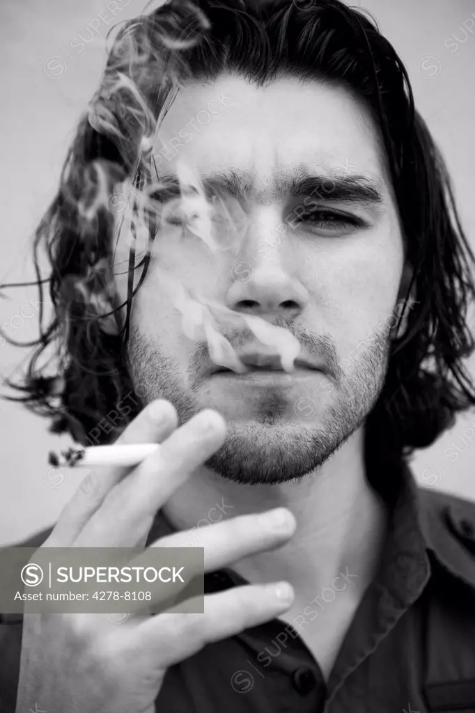Man Smoking Cigarette, Close-up view