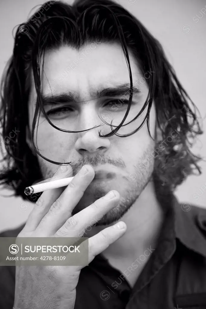 Man Smoking Cigarette, Close-up view