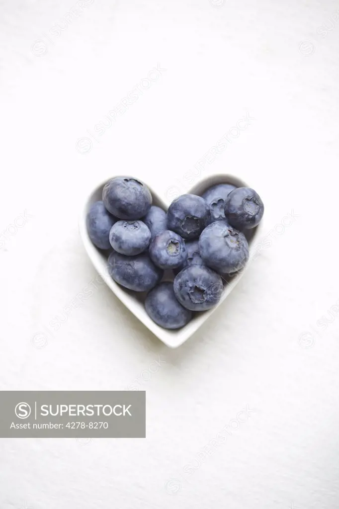 Blueberries in a heart shaped bowl