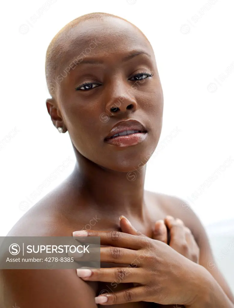 Young Woman with Hands Crossed over Chest