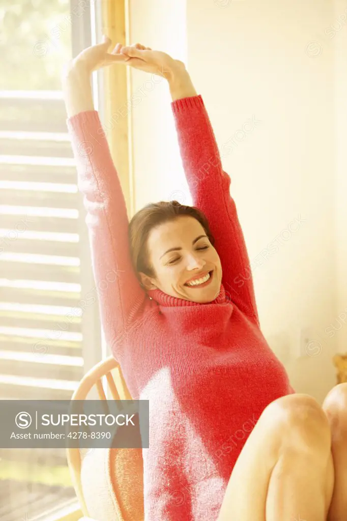 Smiling Woman Stretching Arms