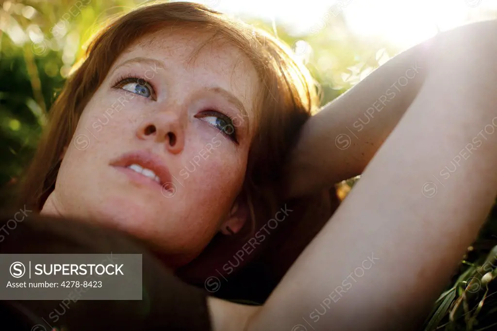 Close up of Woman Lying on Grass
