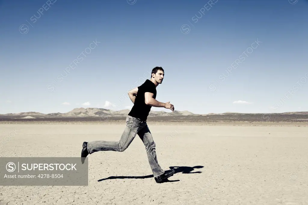 Man Running in Desert Landscape
