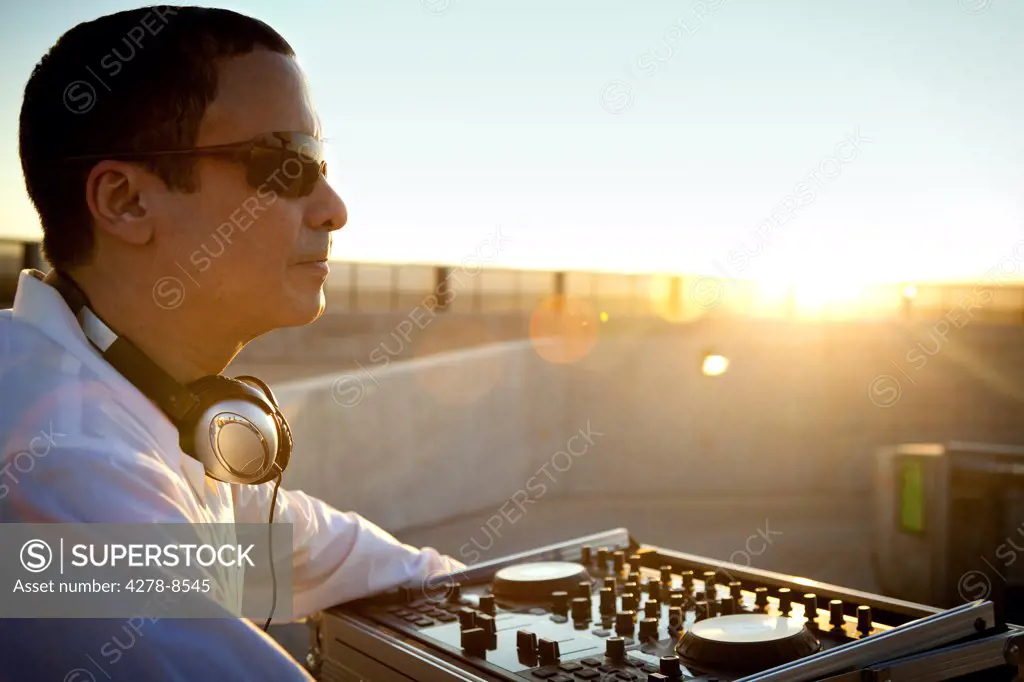 Man DJing at Sunrise