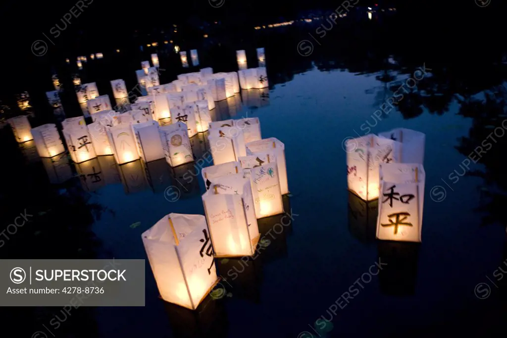 Prayer Paper Lanterns Floating on Water