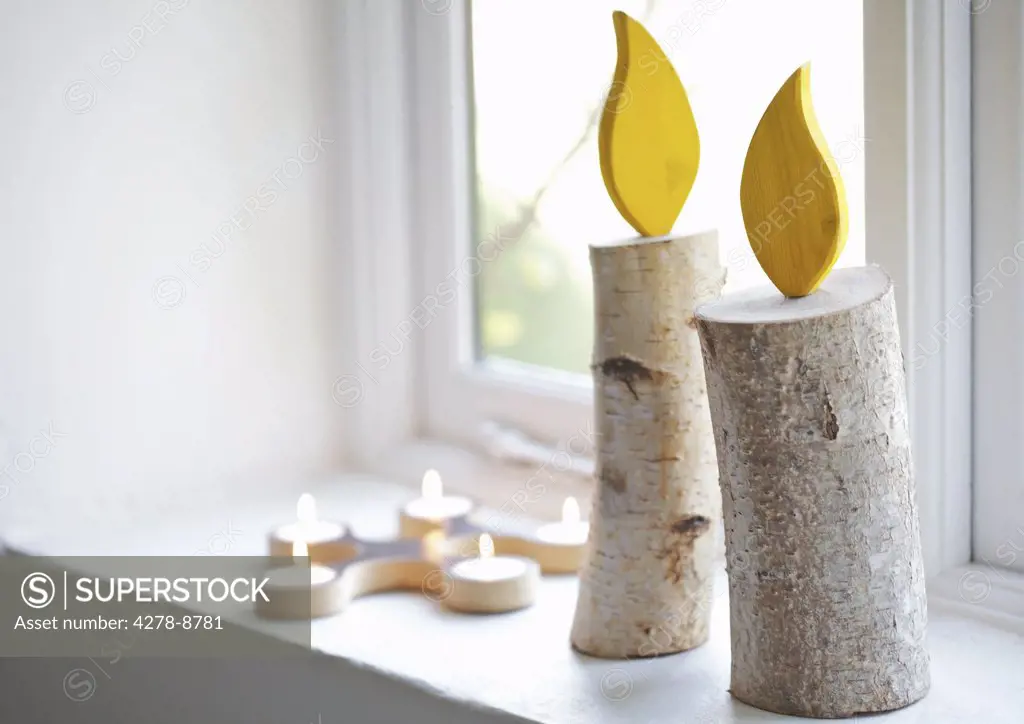 Handmade Decorative Candles on Window Sill