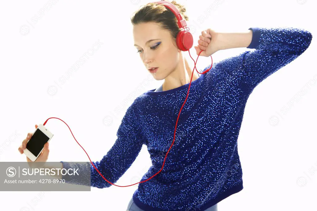 Teenage Girl with Headphones Dancing