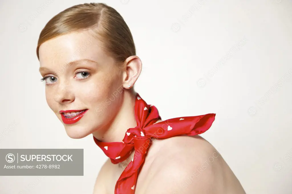 Young Woman with Dental Braces and Red Scarf around Neck