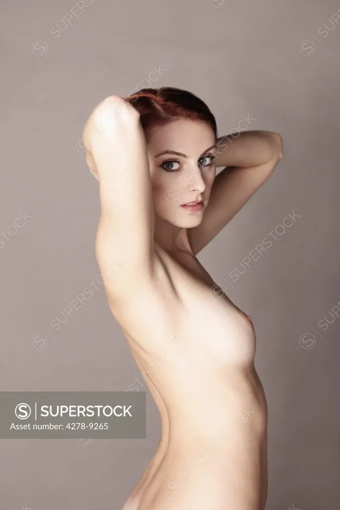 Nude Woman with Arms behind Head
