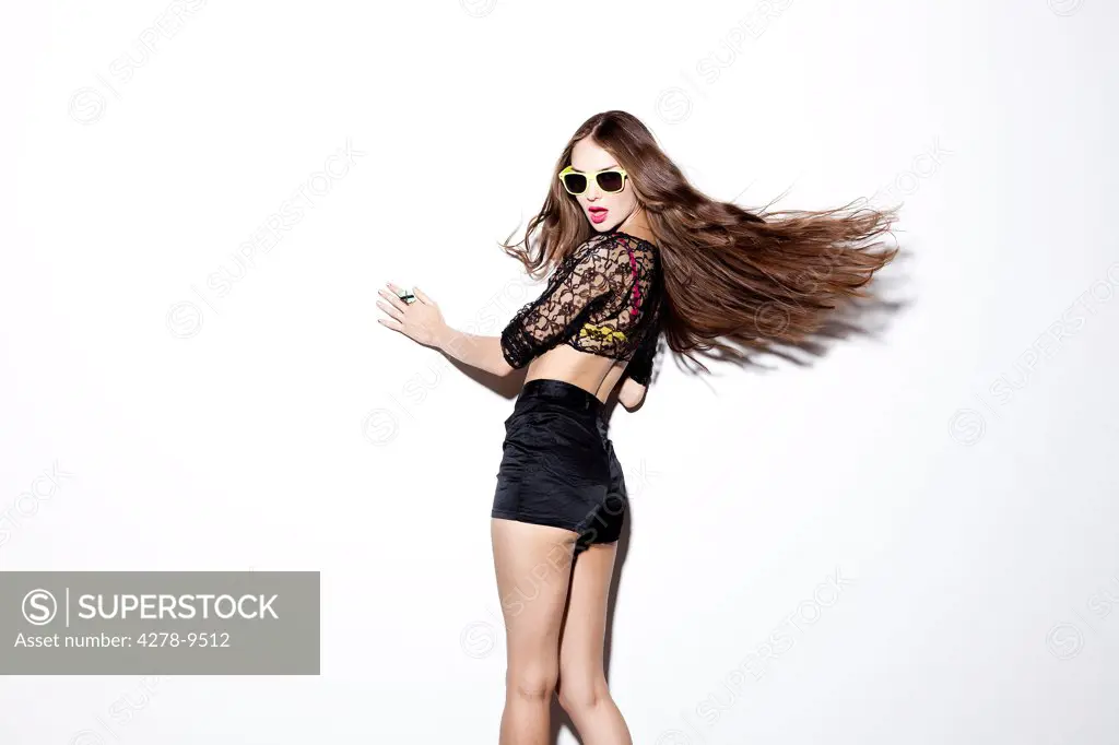 Portrait of Woman Flipping Hair