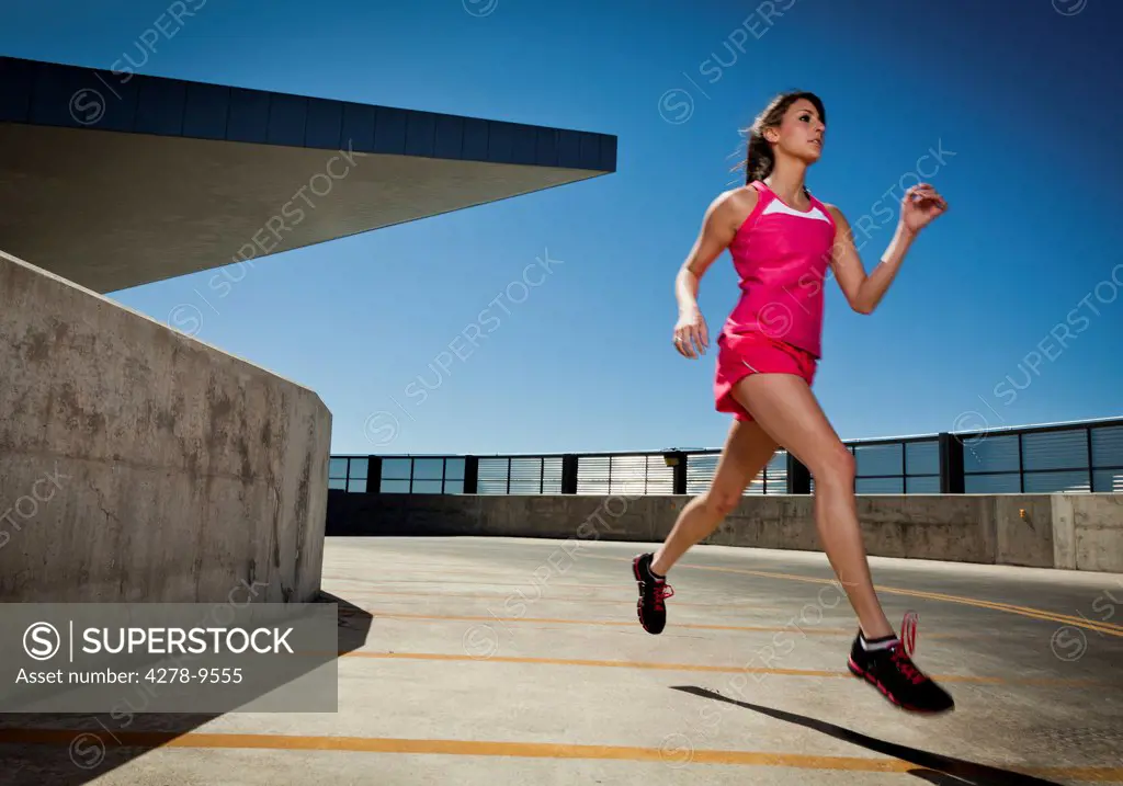 Young Woman Running Outdoors