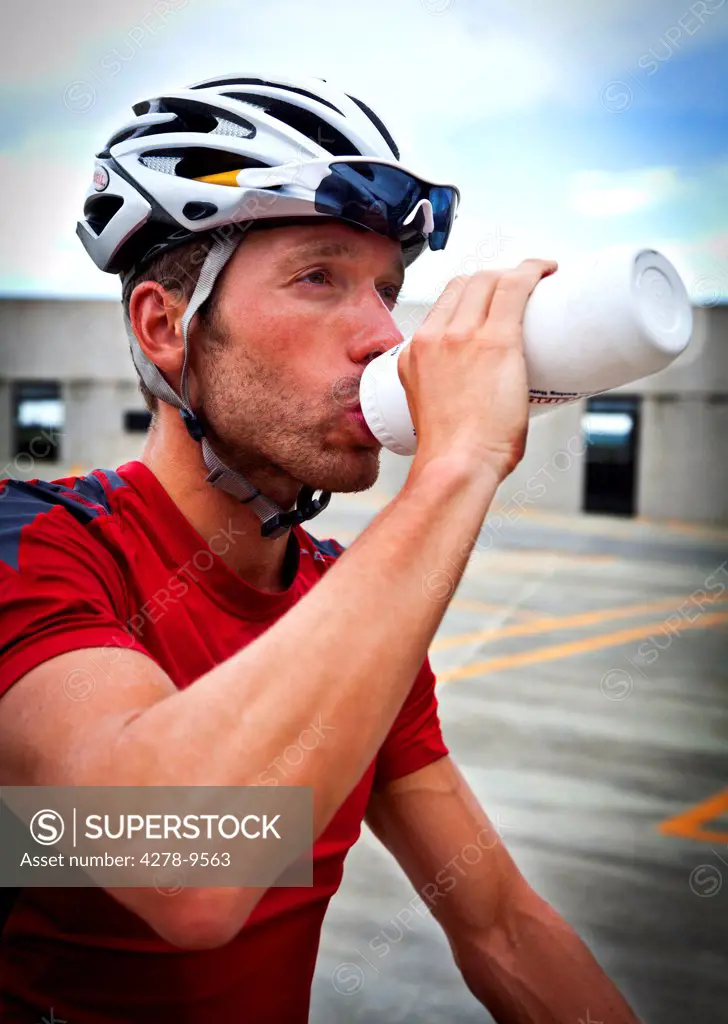 Cyclist Drinking Water