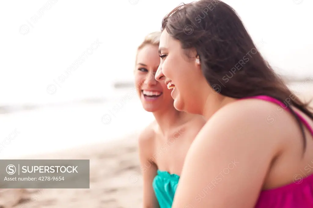 Two Smiling Women on a Beach