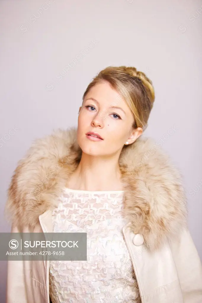 Woman in Fur Trim Coat
