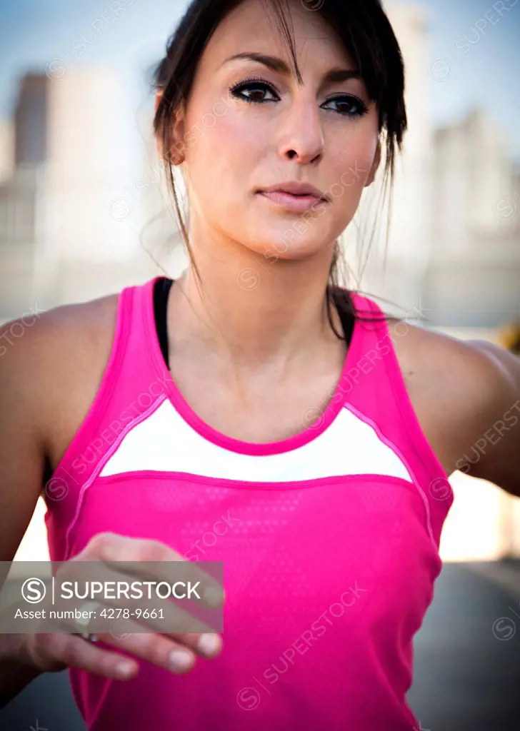 Close up of Young Woman Running Outdoors