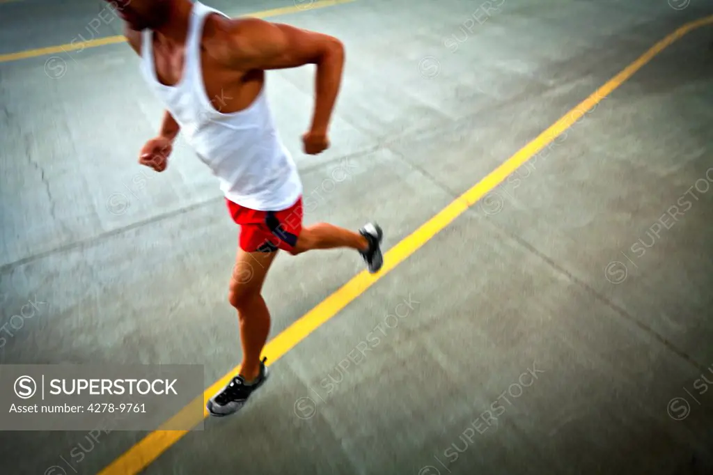Man Running on Urban Road