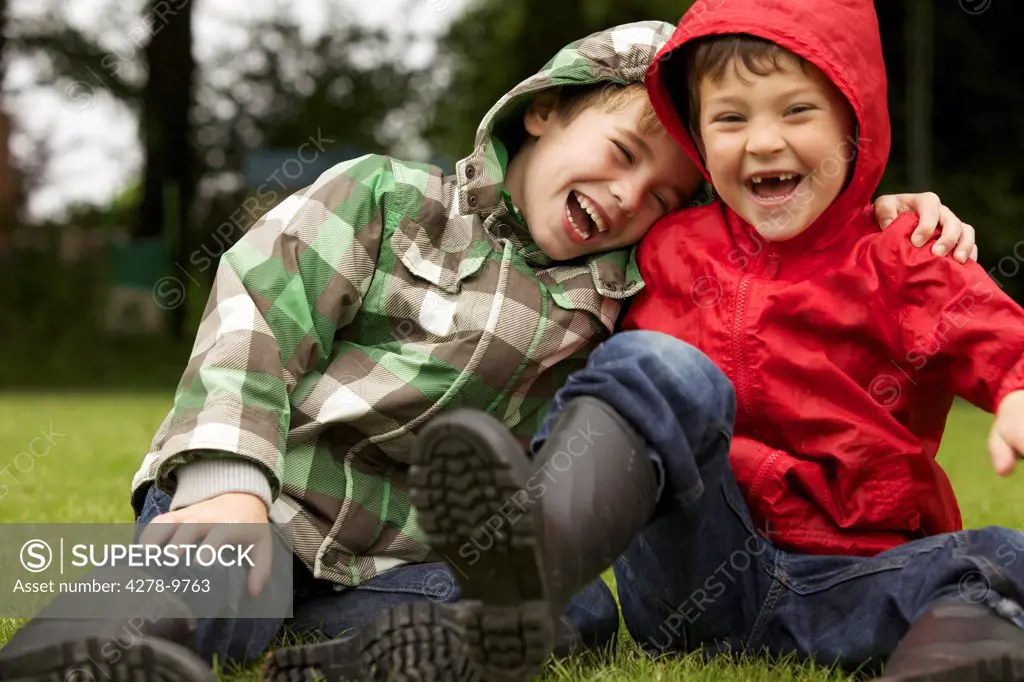 Two Boys Laughing Outdoors